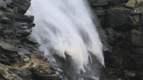 Extreme winds cause a waterfall in to blow upward