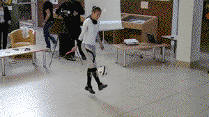 Girl jumping rope while juggling football