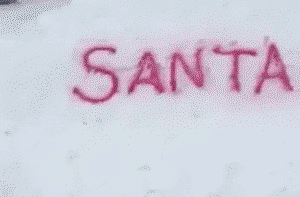 9 year-old girl leaves a message in the snow for Santa