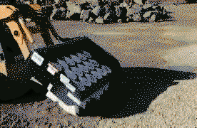 A sandbag filling attachment for excavator