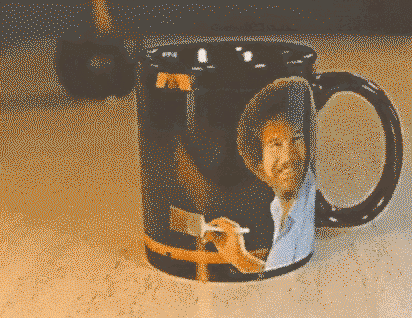 This Bob Ross coffee cup