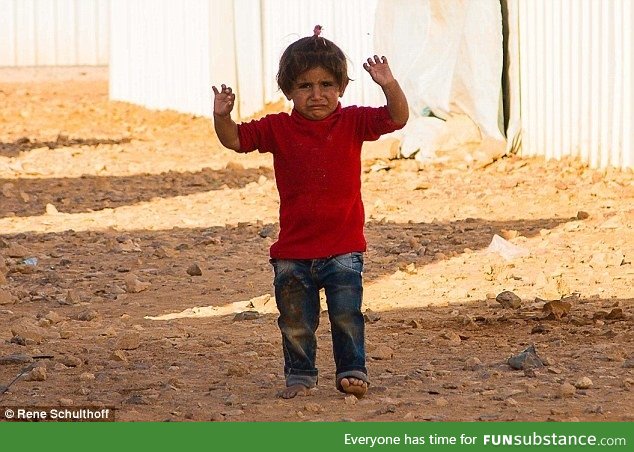 A Syrian child wept in terror when she mistook an aid worker's camera for a gun and