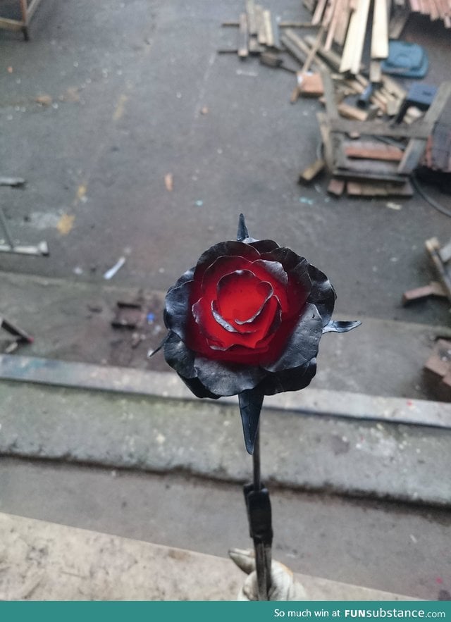 A freshly made metal rose ornament