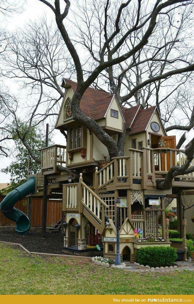 Describe this backyard treehouse in one word - FunSubstance
