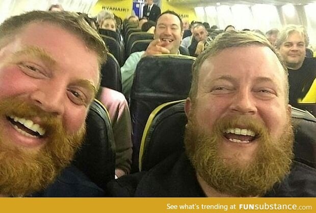 A man unknowingly sat next to his doppelganger on a plane and had to take a selfie