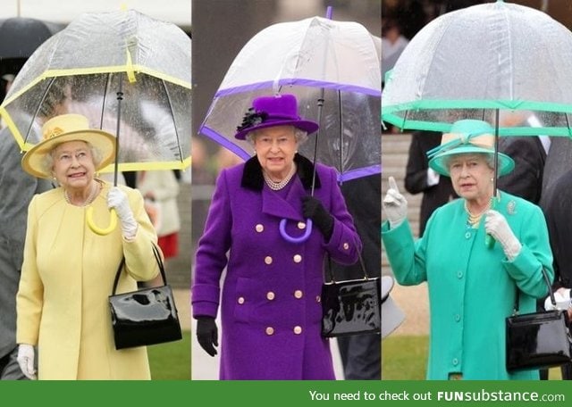 Queen Elizabeth carries her own umbrella, in style