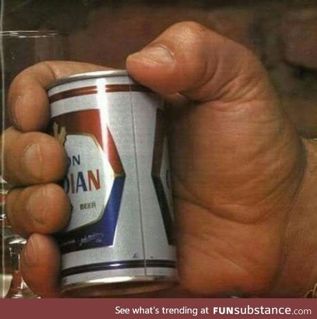 Andre The Giant holding a normal-size (355ml) beer can. Mofo once drank 156 beers