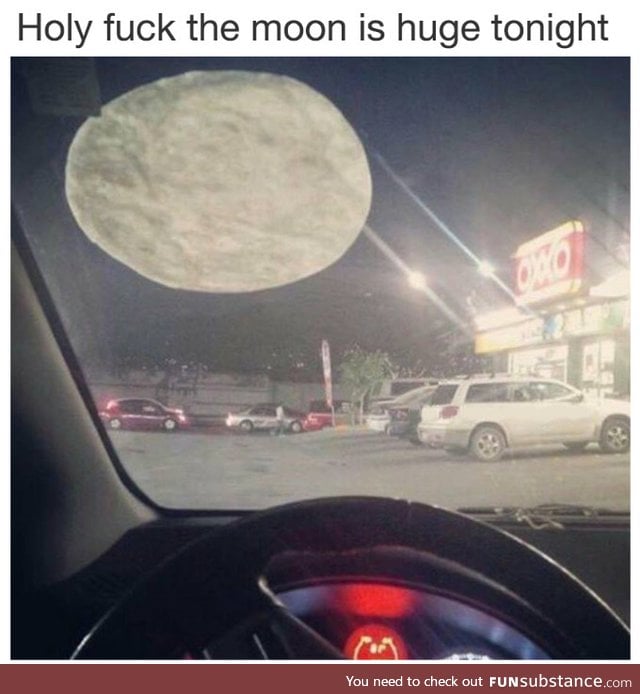 Huge moon in the night sky