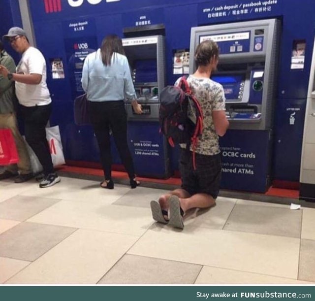 Just a German using an ATM machine in South East Asia