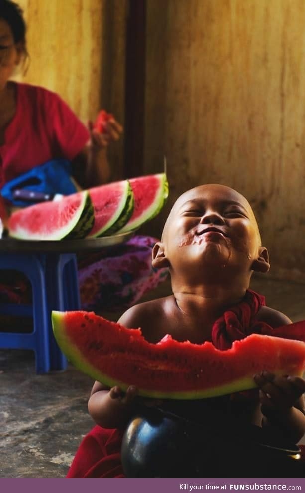 I wish I could be as happy as this kid is with watermelon