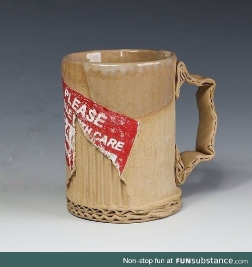 This ceramic coffee mug that looks like it's made of cardboard