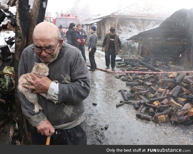 His house is burn down. The cat is his only friend  now. He is 83 years old