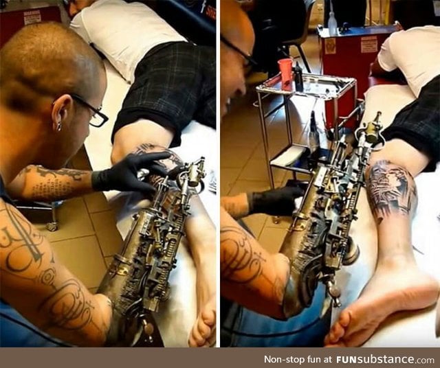 Artist with prosthetic arm turns his arm into a badass tattoo machine
