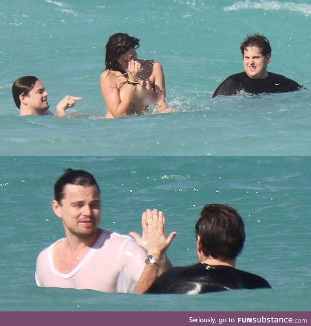 Leonardo DiCaprio and Jonah Hill swimming in the ocean