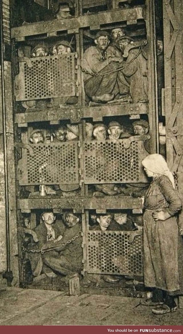 Mine workers getting ready to descend into a mine. Circa 1970