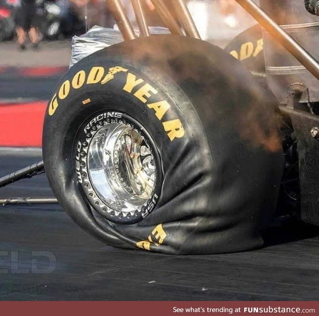 What 10k horsepower on a drag racing tire looks like