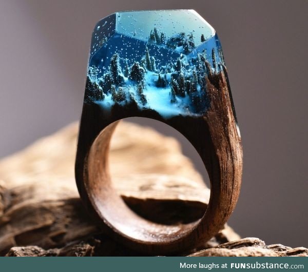 Snowy forest ring made out of wood and resin