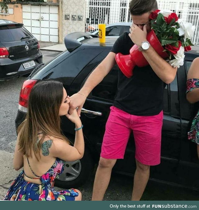 Rare photo of a girl showing some love to a guy