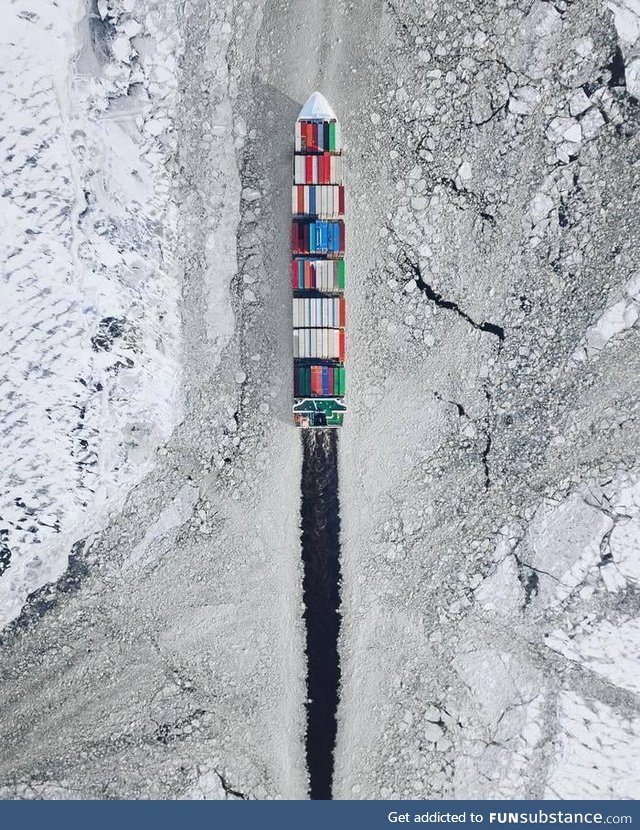 Container ship breaking ice on the Baltic sea