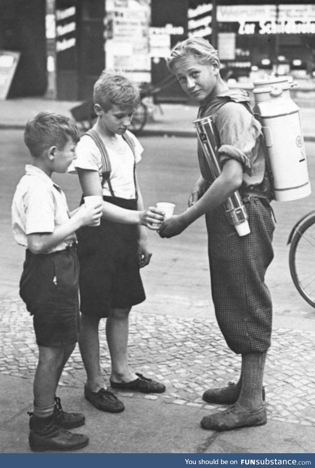 Boy with a portable lemonade stand, 1931