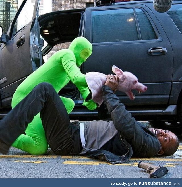 Will Smith being assaulted by a man with a hand puppet