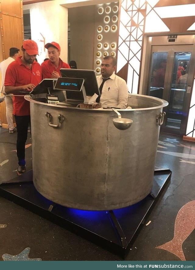 This front desk designed as a cooking pot