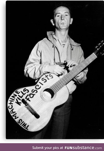 Woody Guthrie and his guitar, roundabout 1941's