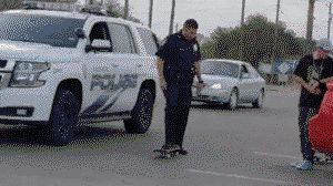 Texas poilice officer does perfect kickflip!
