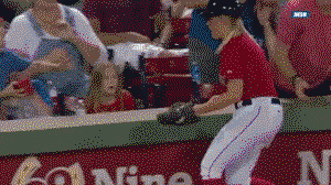 Smooth kid gives foul ball to girl sitting behind him