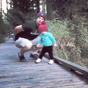Dad saves kid from falling off bridge