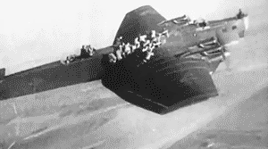 Soviet paratroopers sliding off a Tupolev TB-3