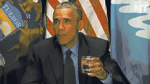 President Obama Drinking a Glass of Water One Handed