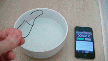 Nitinol paper clip into water