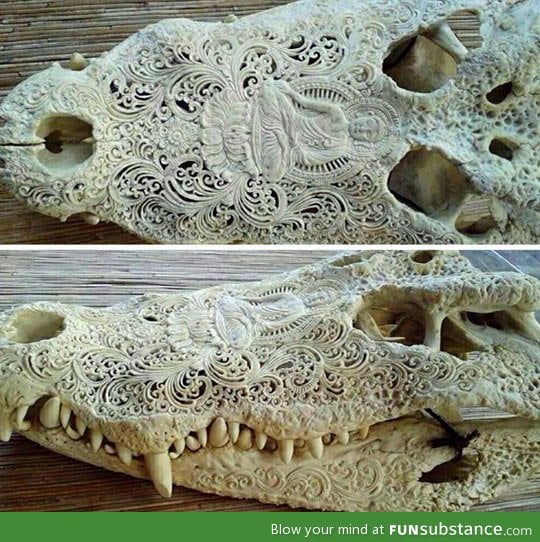 Carved alligator skull