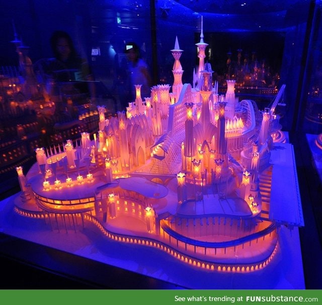 A beautifully lit castle made entirely out of paper