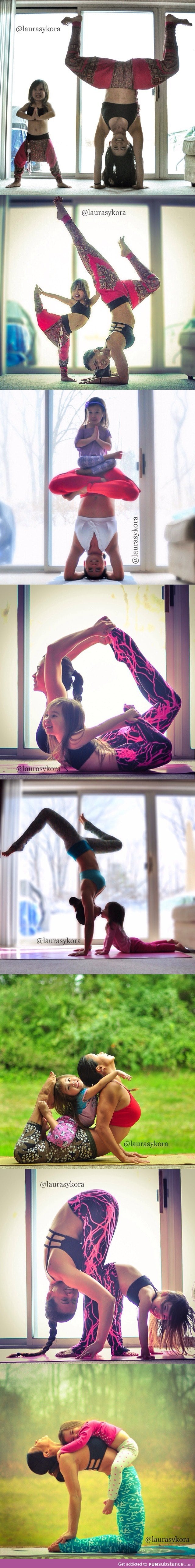 Little girl does yoga poses with her mom.