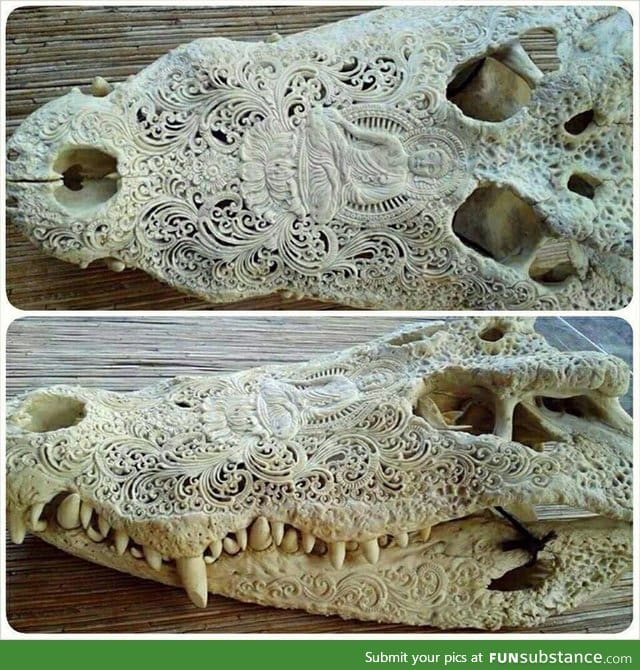 Carved alligator skull
