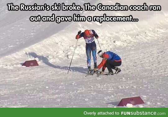 Canadian coach helping out a Russian during a race