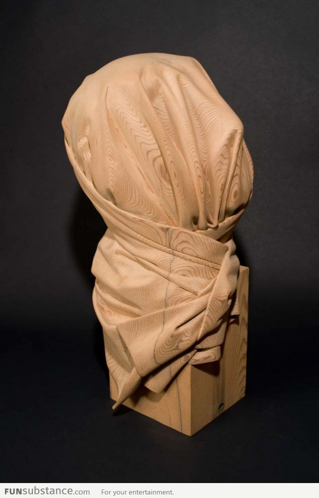 Looks like cloth? Nope, it's a wood sculpture