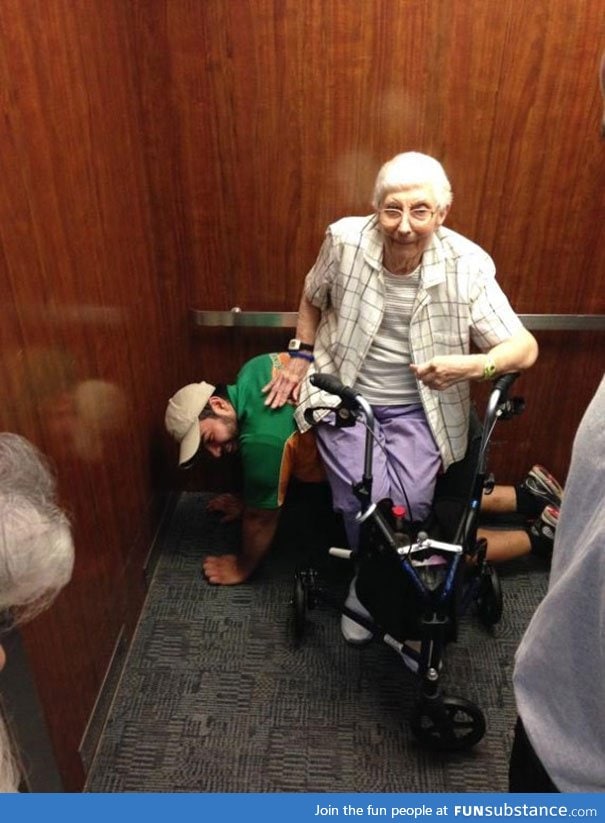 Man Serves As Bench For Elderly Woman Stranded In Elevator