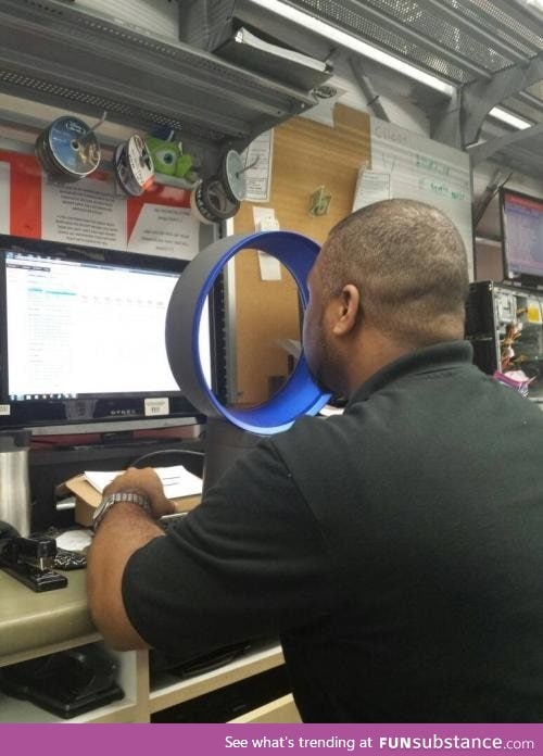 This is how you use a Dyson fan in a hot office