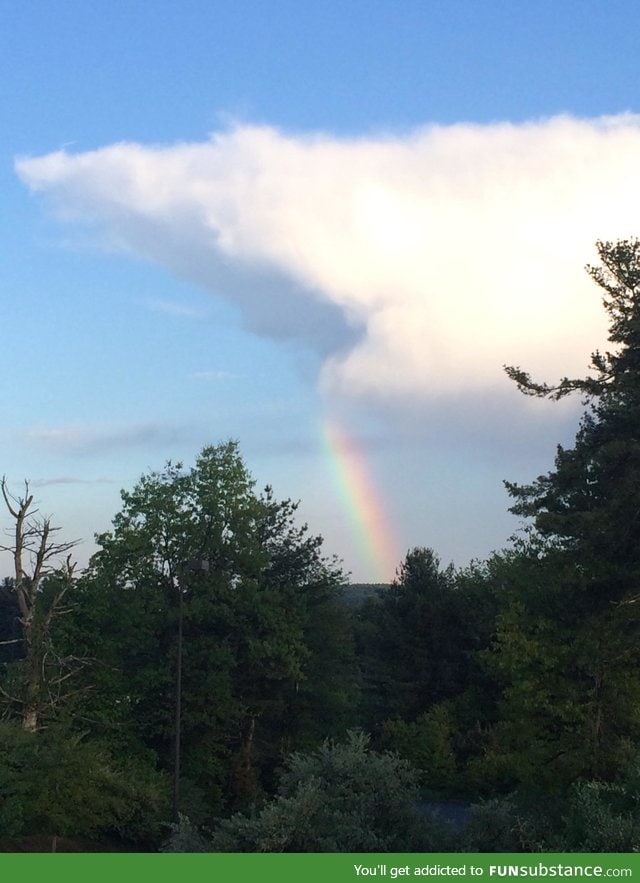 Cloud shark drooling a rainbow