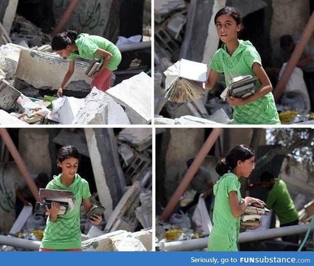 Palestinian girl looking for her books under the ruins of her home