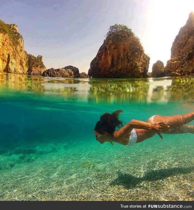 Crystal clear water in La Grotta Cove, Corfu Island, Greece..Amazing :O