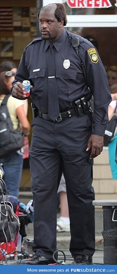 What a soda can looks like in Shaq's hands