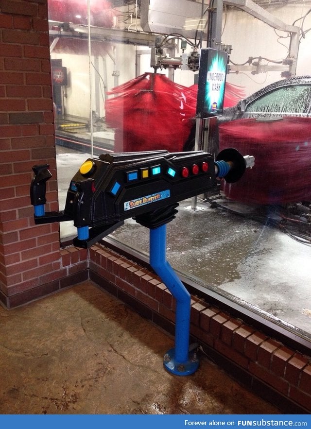 This car wash has a gun where you can shoot cars as they come by