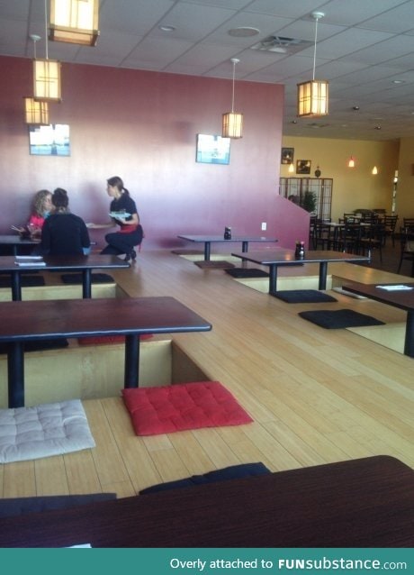 This Japanese restaurant has tables that go into the floor