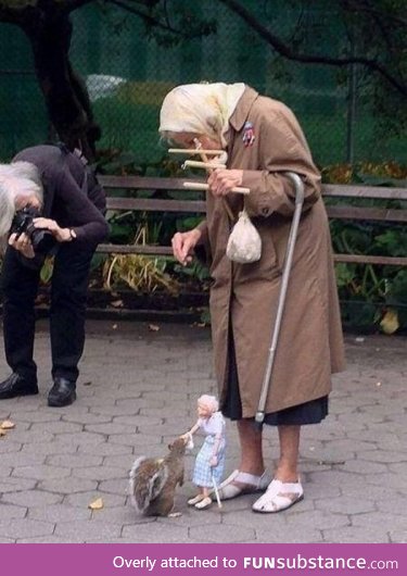 Old Woman using a Marionette to feed Squirrels