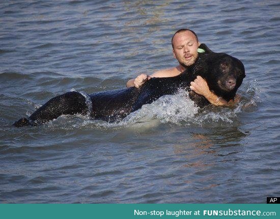 Man pulls bear to safety after it was tranquilized and near drowning