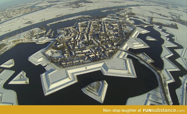 Beautiful village in the Netherlands covered in snow